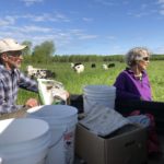 two farmers with ATV