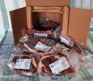 insulated shipping box with steaks and ground beef